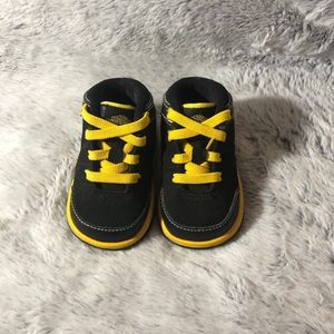 Toddler Air Jordan black and yellow size 2C